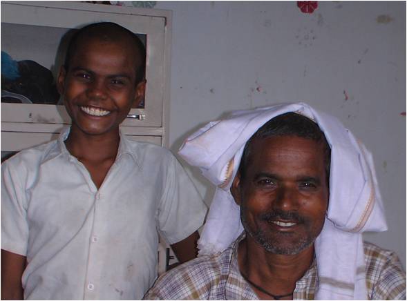 Photo of a boy restored with his father